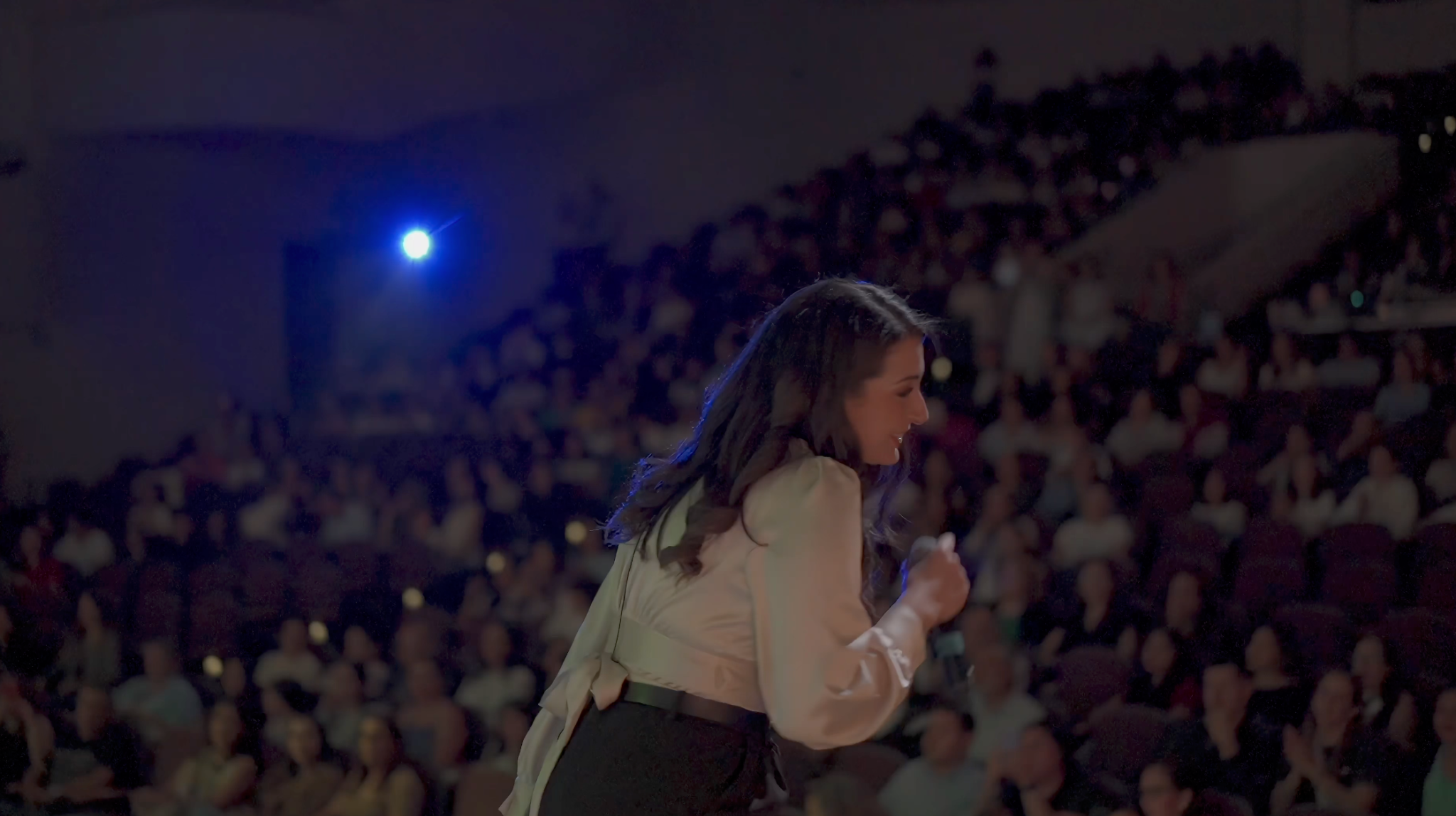Mariana performing before a large audience